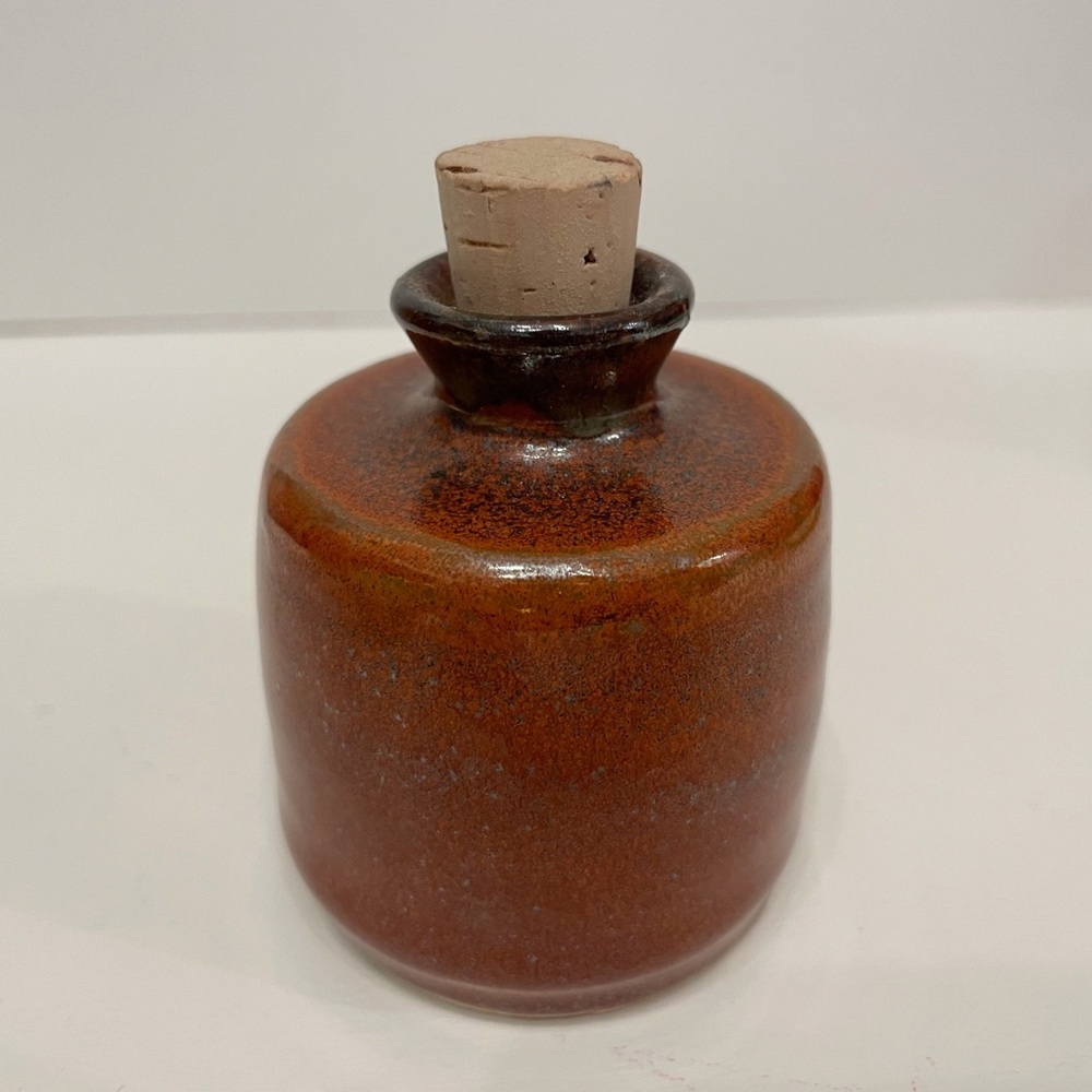 petite corked ceramic bottle